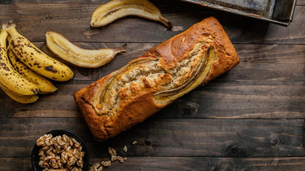 Homemade Starbucks Banana Bread Sliced on a Wooden Cutting Board