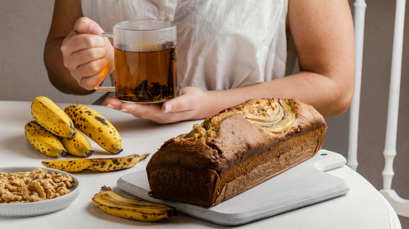 Simply Recipes Banana Bread - Moist and Delicious Loaf on a Wooden Cutting Board