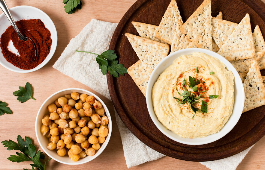 Bowl of creamy Rotel dip with tortilla chips