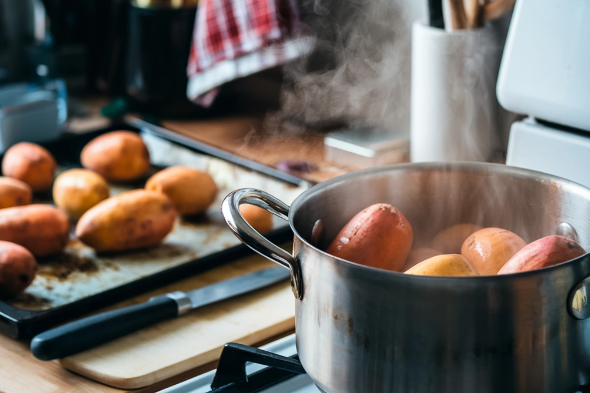 Boiling yams before baking with kitchen tools