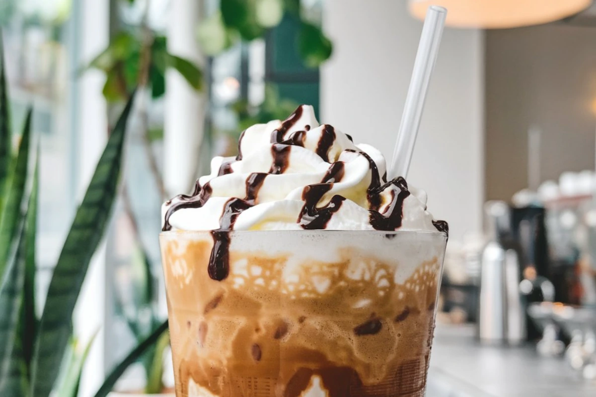 Homemade Frappuccino with whipped cream and caramel drizzle